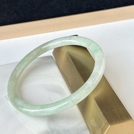 12857 57.0mm Translucent Green Slim Cut Rounded Jade Bangle