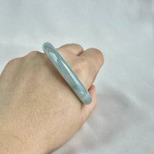Load image into Gallery viewer, 111754 53.5 Oval Highly Translucent Blue Jadeite Bangle
