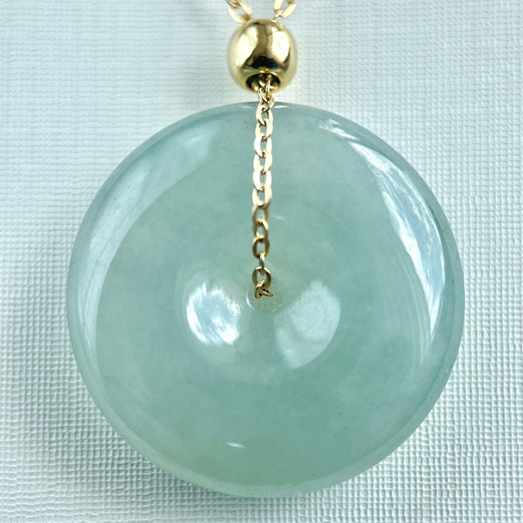 33389 Translucent Light Green Jadeite Donut Pendant