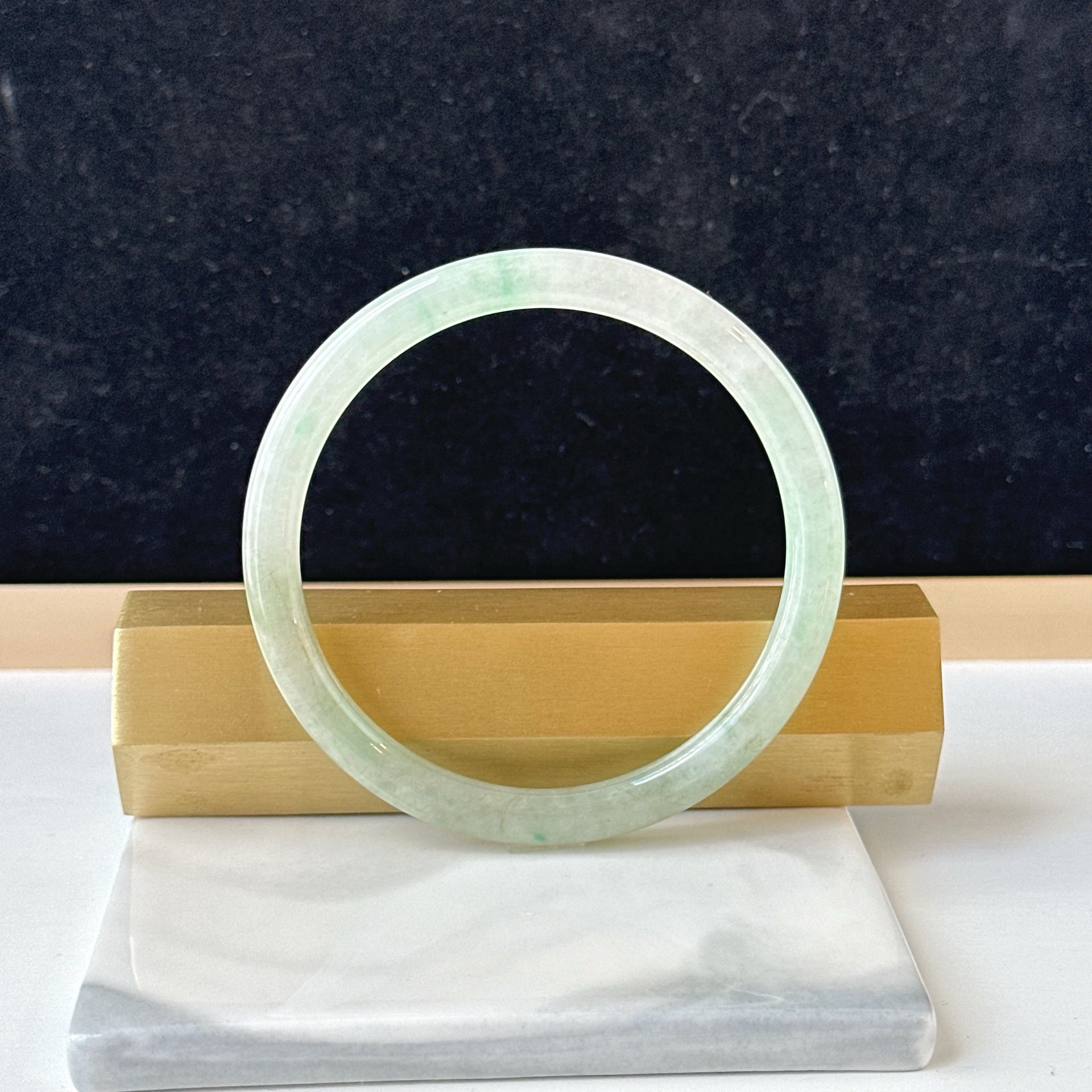 12857 57.0mm Translucent Green Slim Cut Rounded Jade Bangle