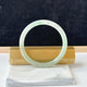 12857 57.0mm Translucent Green Slim Cut Rounded Jade Bangle
