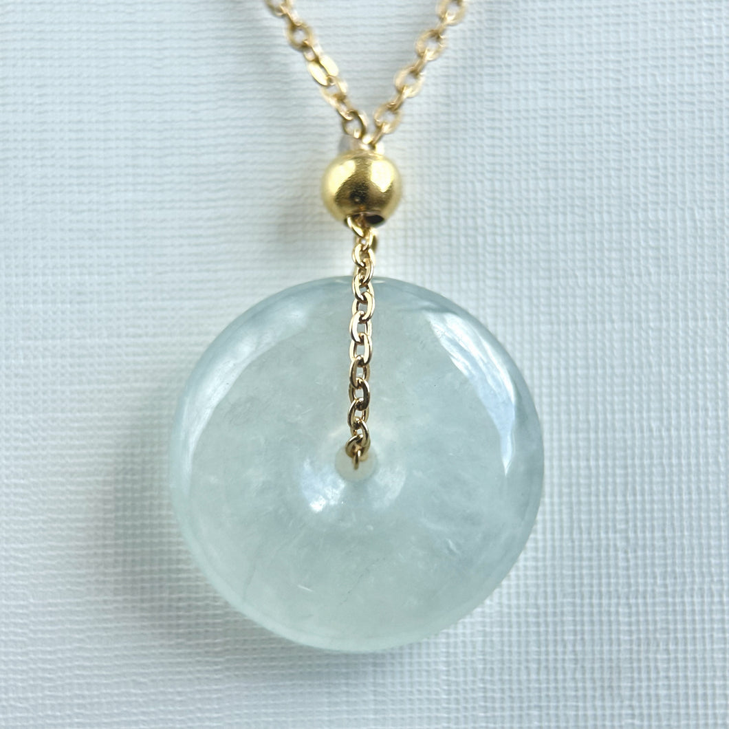 619488 Highly Translucent Icy White Jadeite Donut Pendant