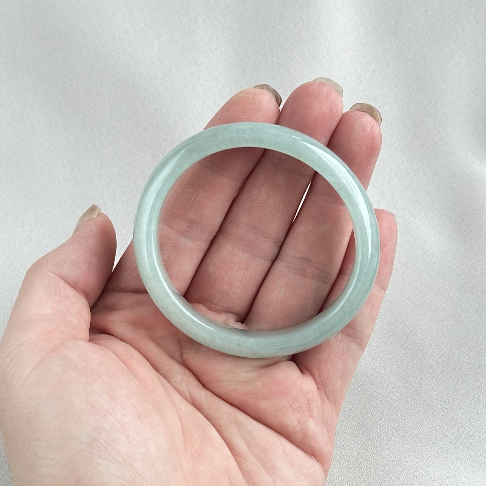 蓝静云光 Glacier Blue Oval Jadeite Bangle 55.0mm