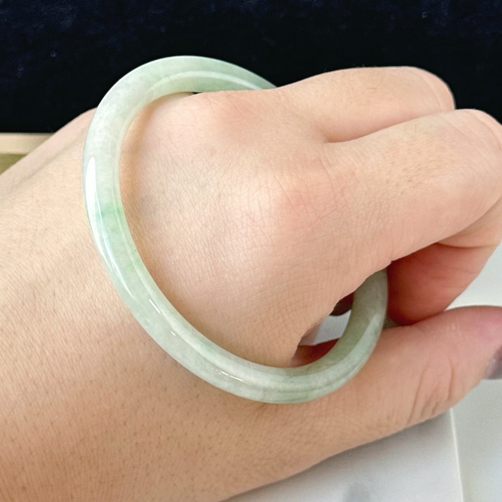 12857 57.0mm Translucent Green Slim Cut Rounded Jade Bangle