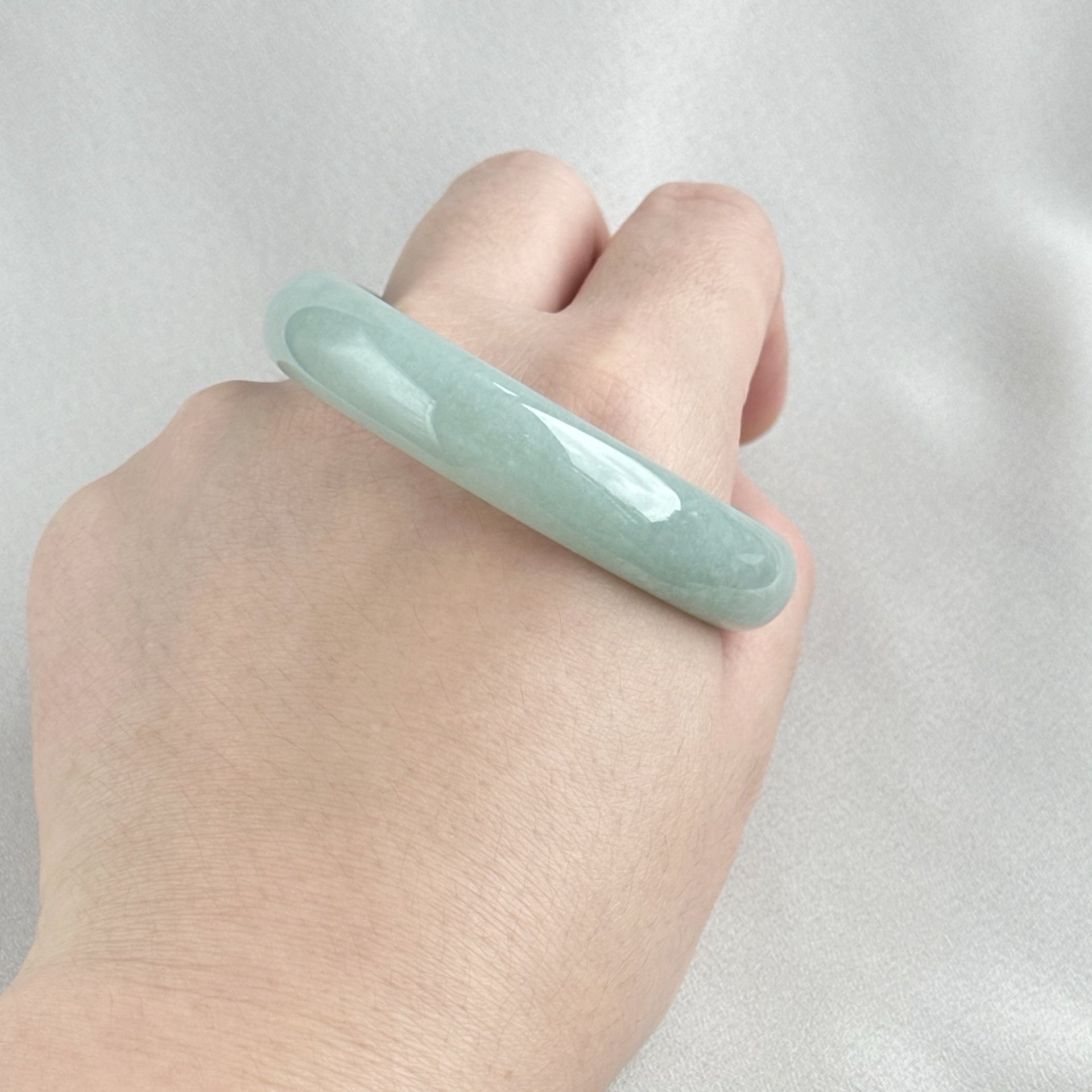 蓝静云光 Glacier Blue Oval Jadeite Bangle 55.0mm