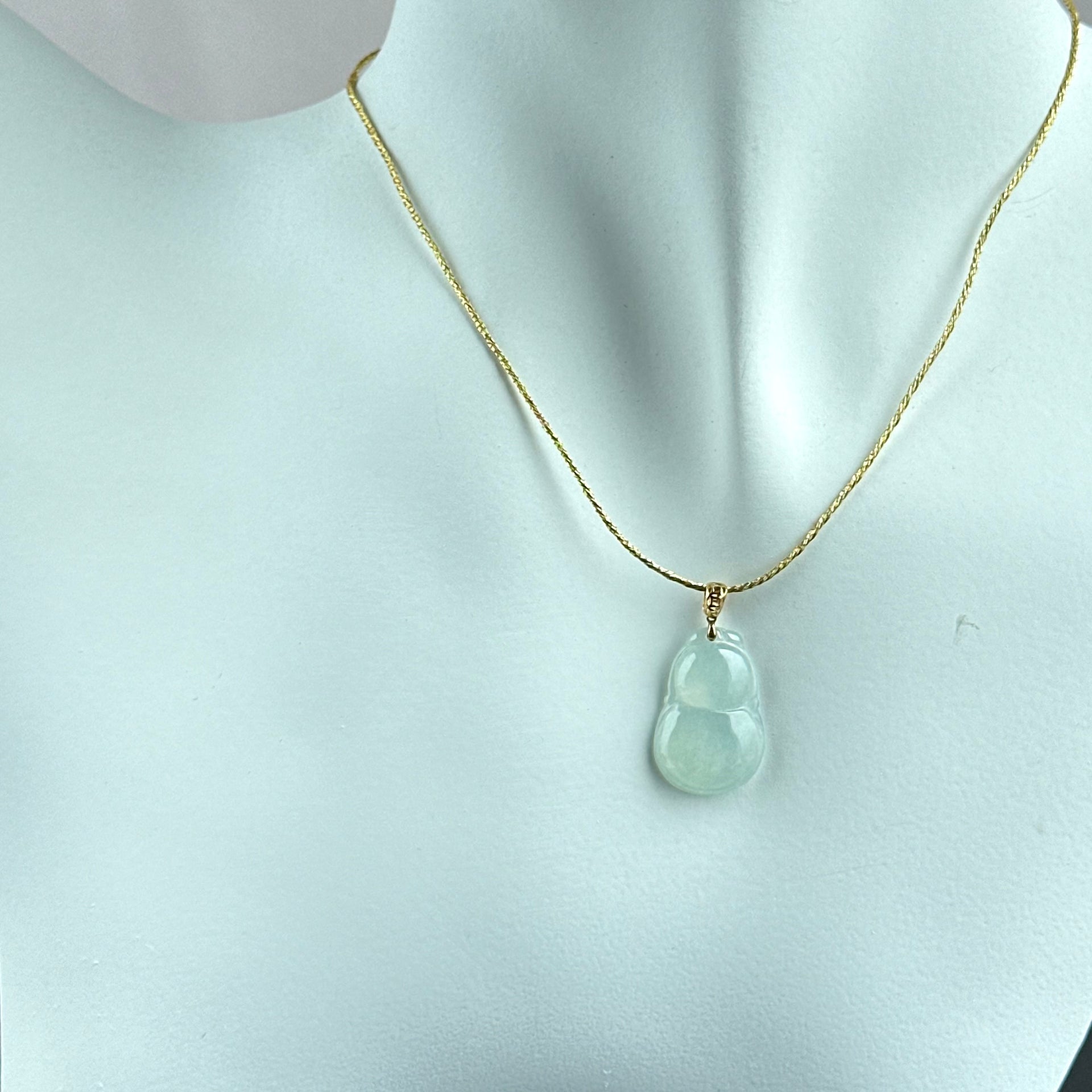 13191 Highly Translucent Light Green Hulu Jadeite Pendant