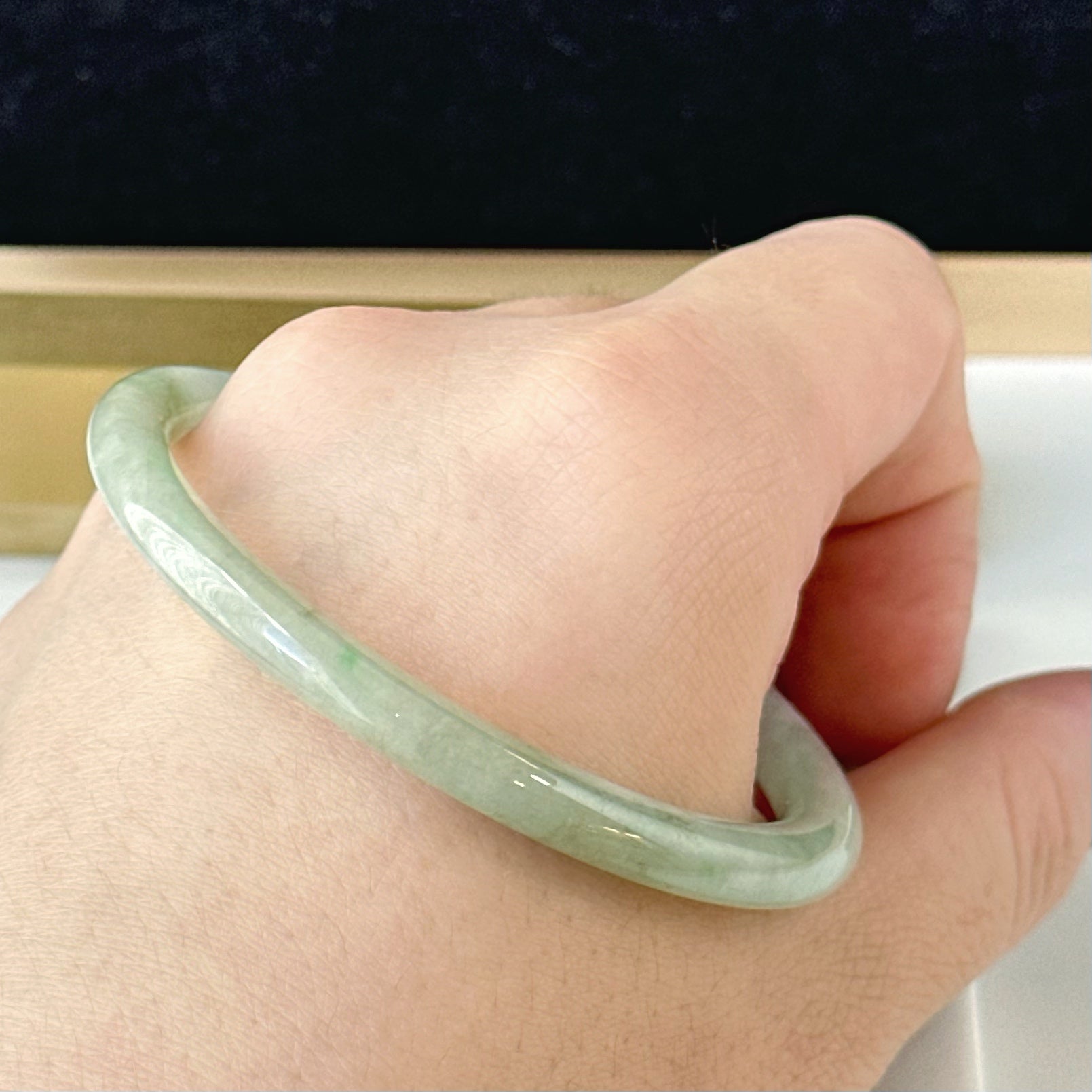 12857 57.0mm Translucent Green Slim Cut Rounded Jade Bangle