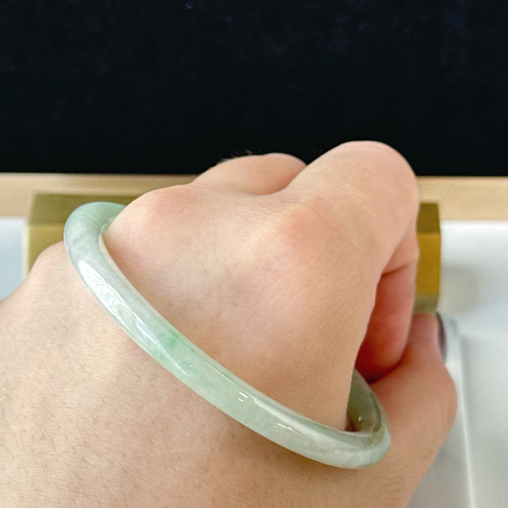 12857 57.0mm Translucent Green Slim Cut Rounded Jade Bangle