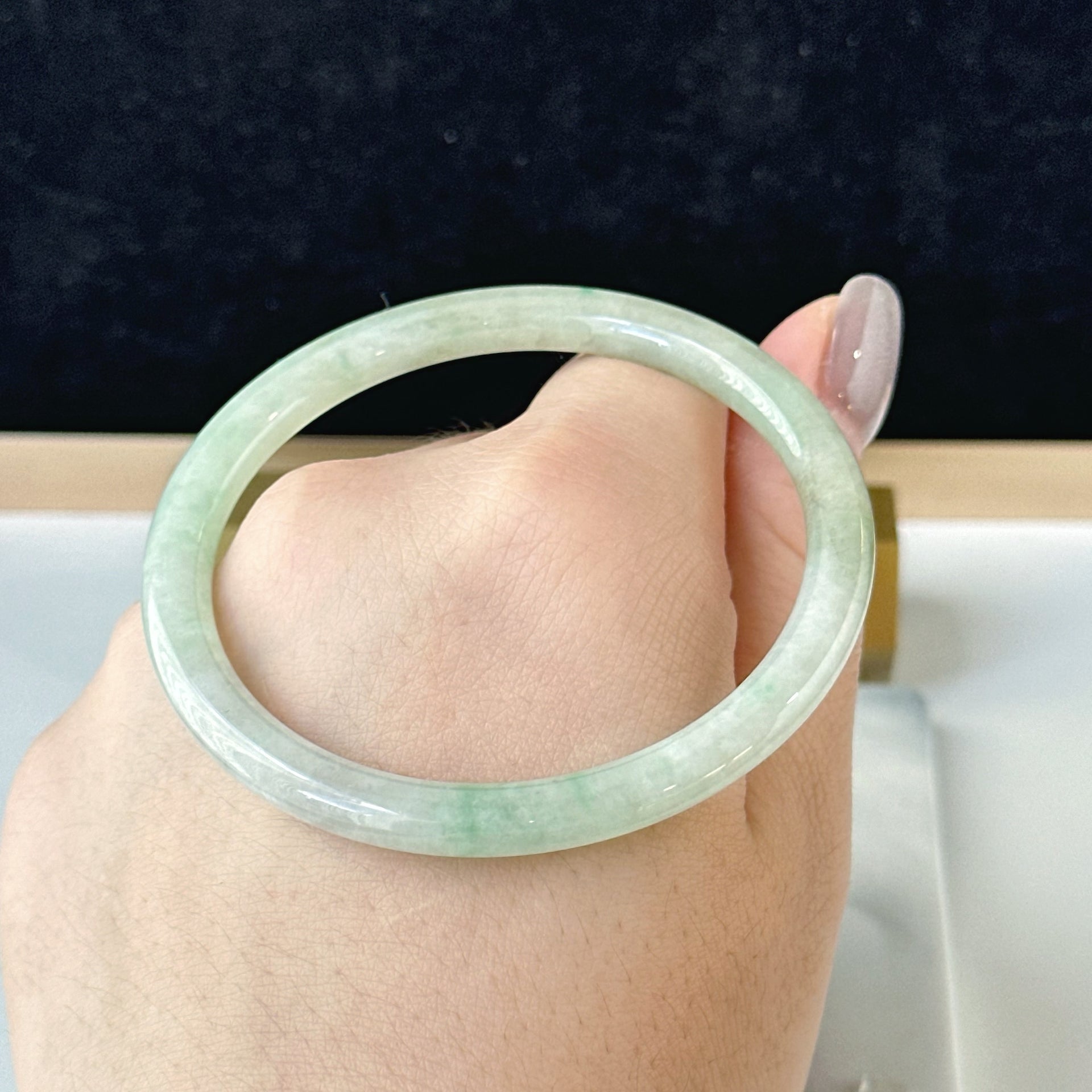 12857 57.0mm Translucent Green Slim Cut Rounded Jade Bangle