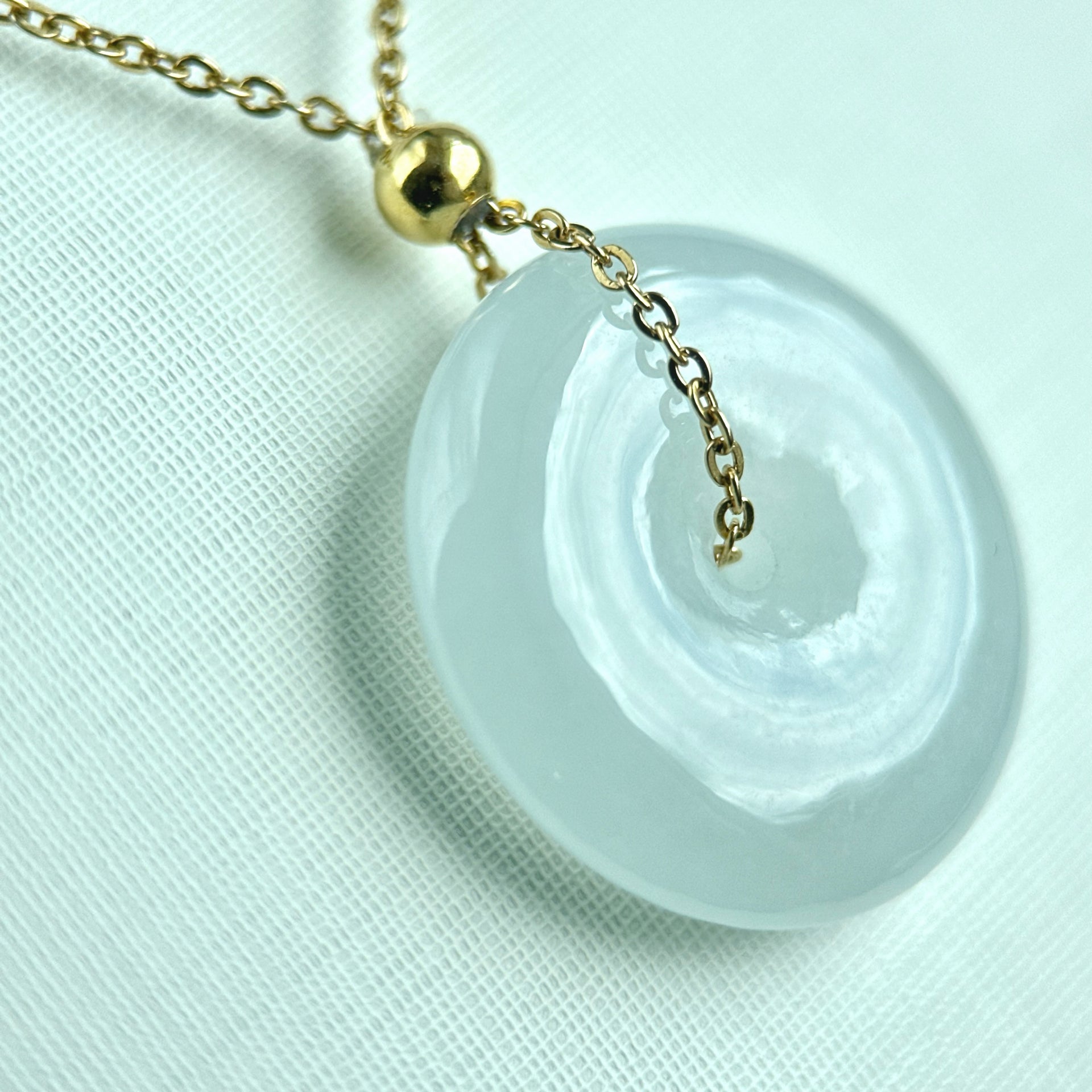 33390 Translucent White Jadeite Donut Pendant