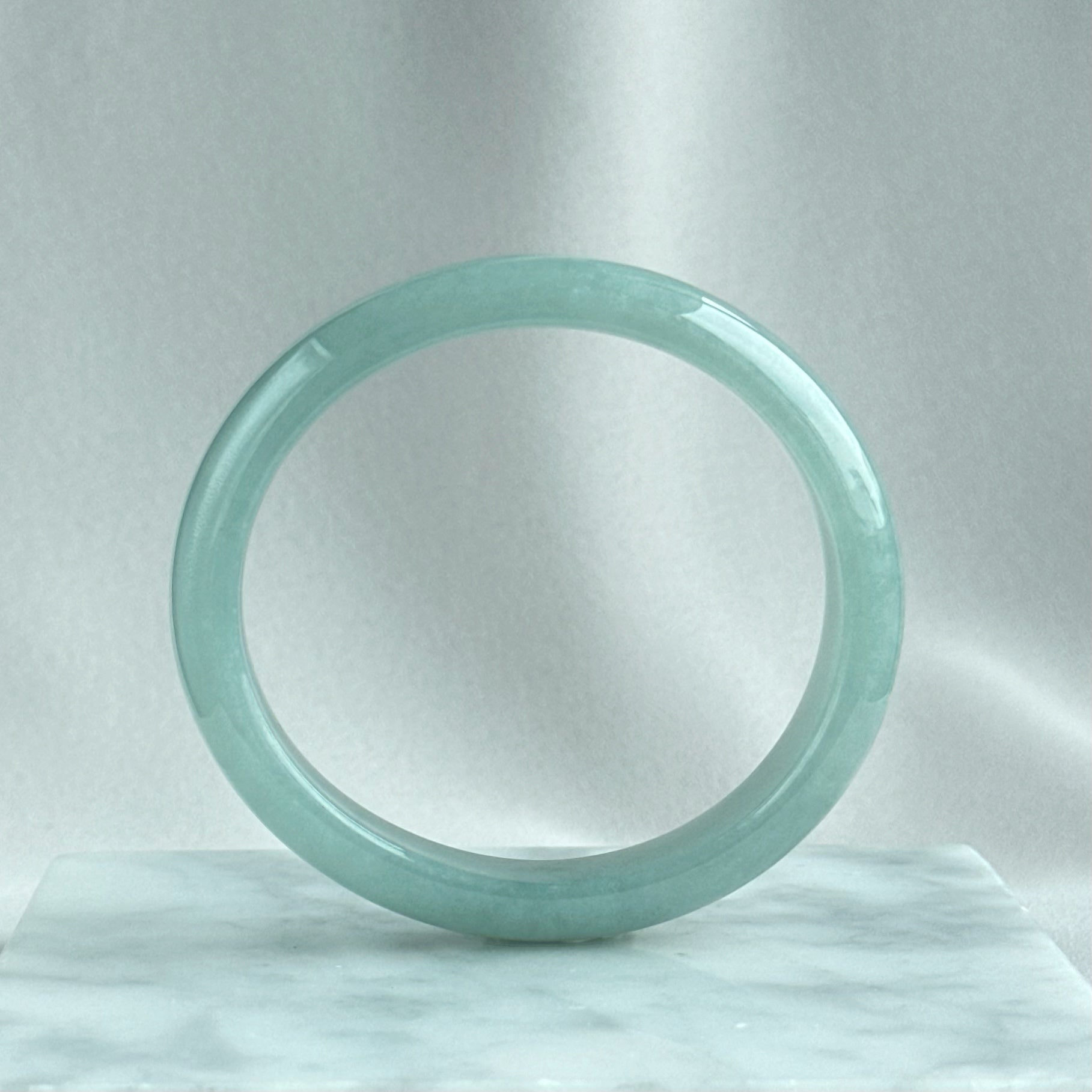 蓝静云光 Glacier Blue Oval Jadeite Bangle 55.0mm