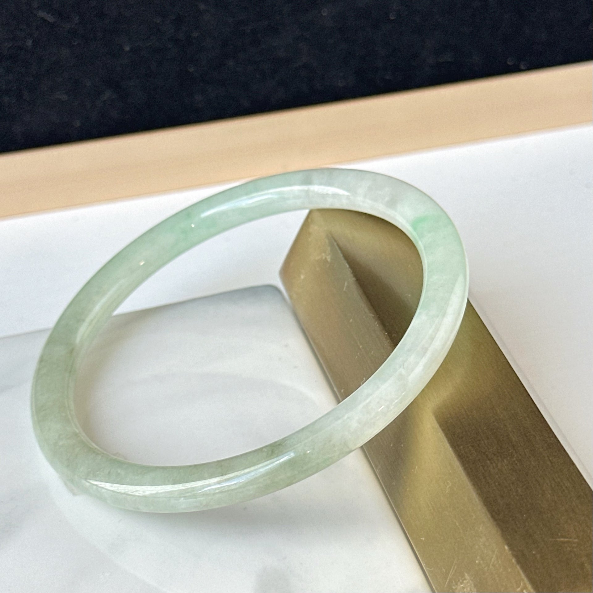 12857 57.0mm Translucent Green Slim Cut Rounded Jade Bangle