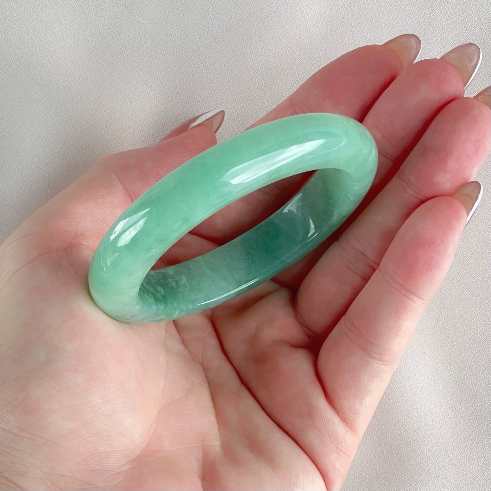 10455 55.0mm Full Bright Green Jadeite Bangle