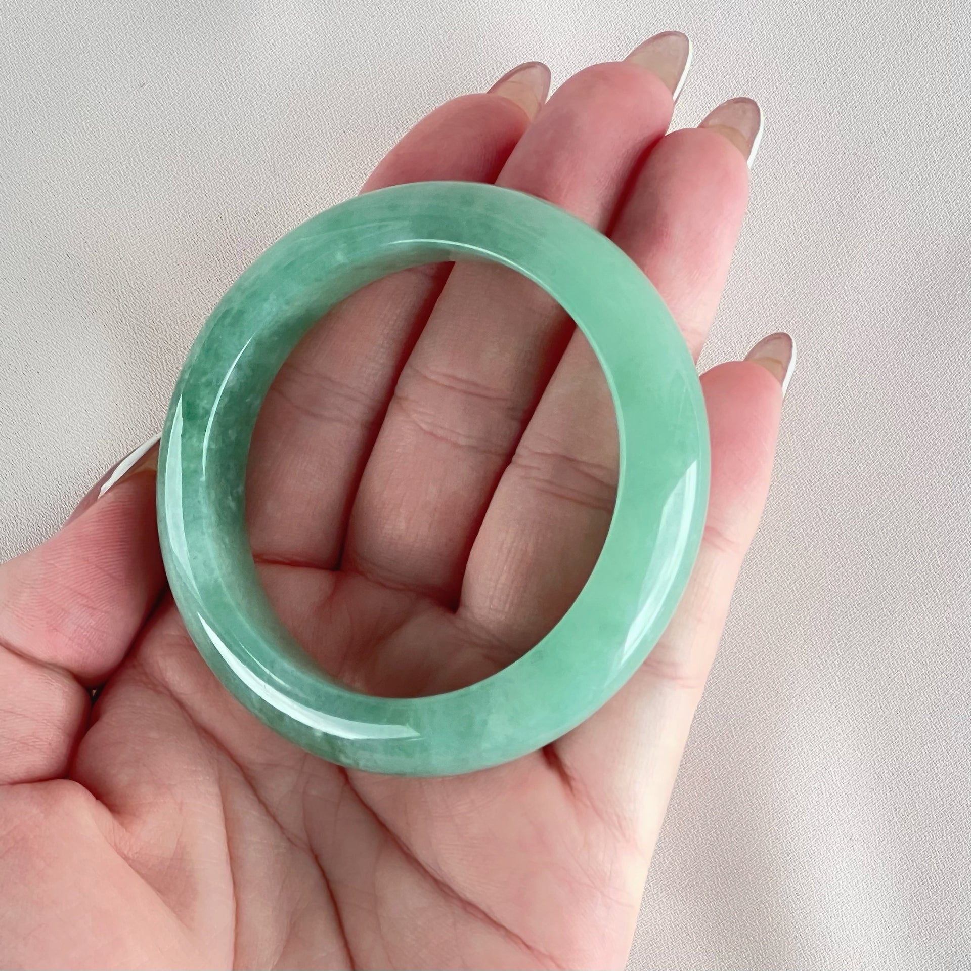 10455 55.0mm Full Bright Green Jadeite Bangle