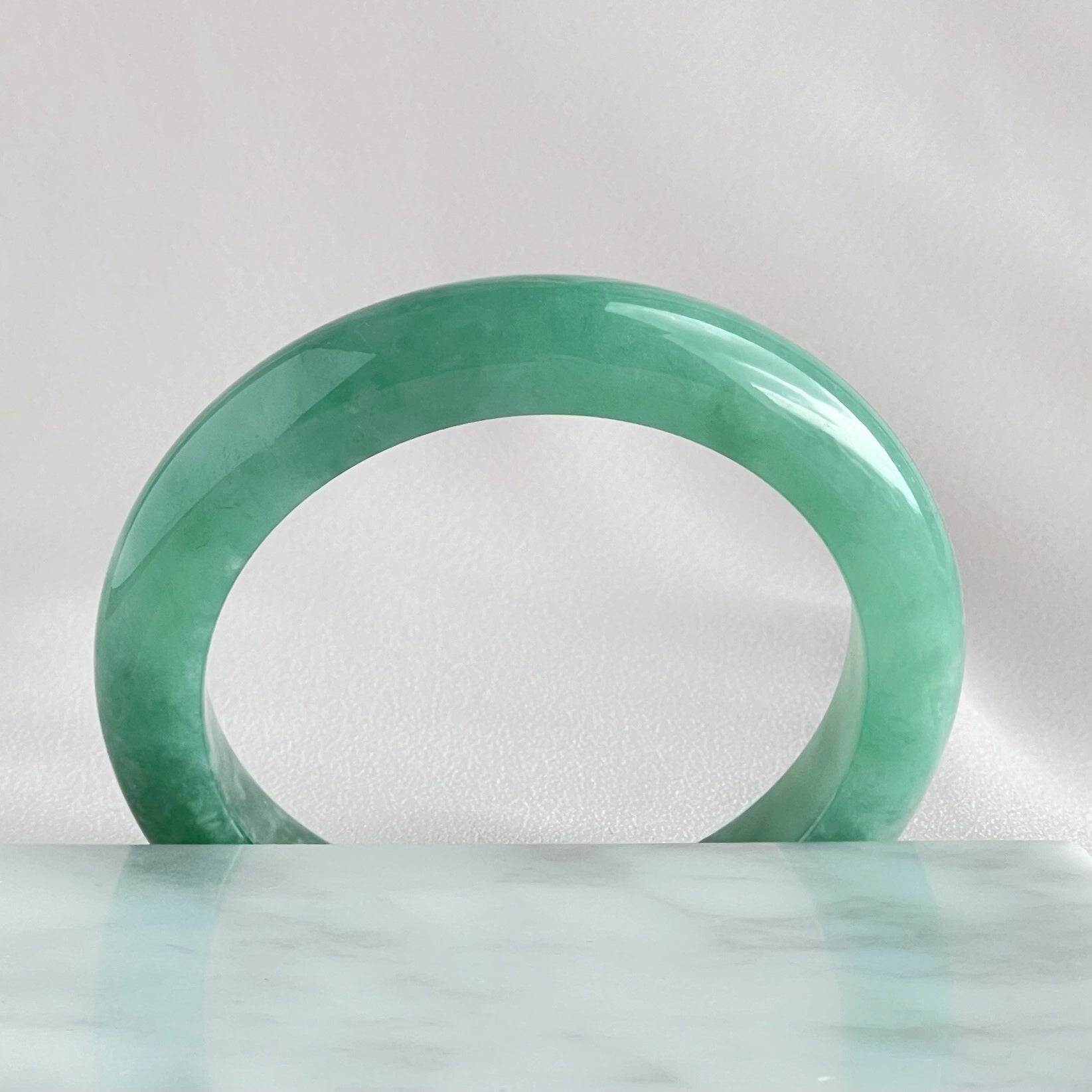 10455 55.0mm Full Bright Green Jadeite Bangle